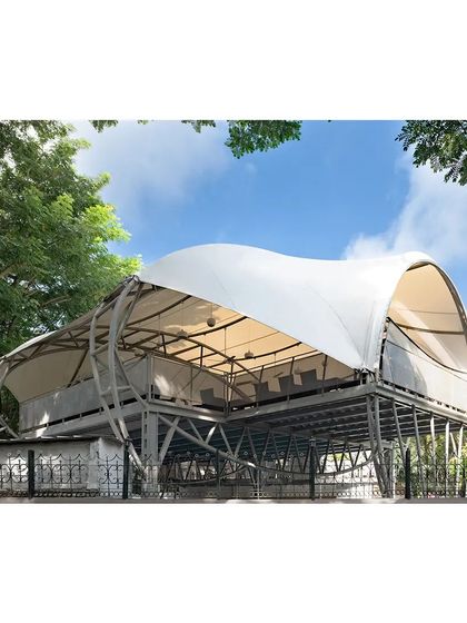 This project involved designing a restaurant deck over an existing swimming pool for the RMV Club. The structure is a unique typology, using a tensile fabric roof and an exposed steel skeleton to create a light, airy, and column-free space for dining.