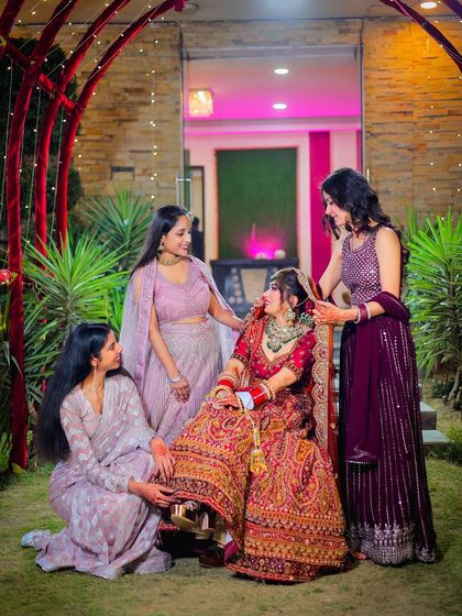 A sweet moment between the bride and her bridesmaids, a memory she will cherish.