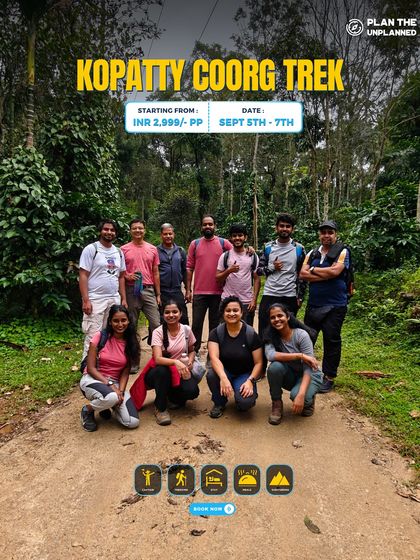 A group of friends on the Kopatty Coorg trek, a trail that takes you through dense forests and open meadows.