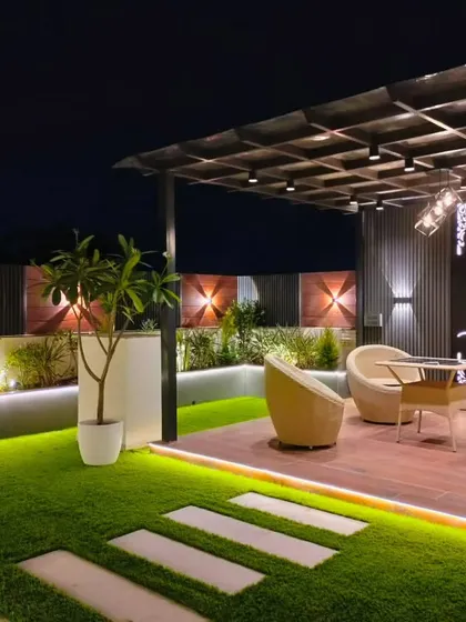 The pergola area viewed from the lawn, showing how the different elements of the terrace garden come together in a cohesive design.