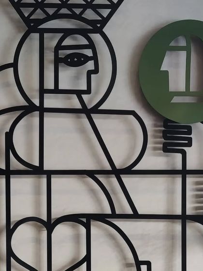 A close-up detail of the Queen figure from the 'Queen's Gambit' installation.