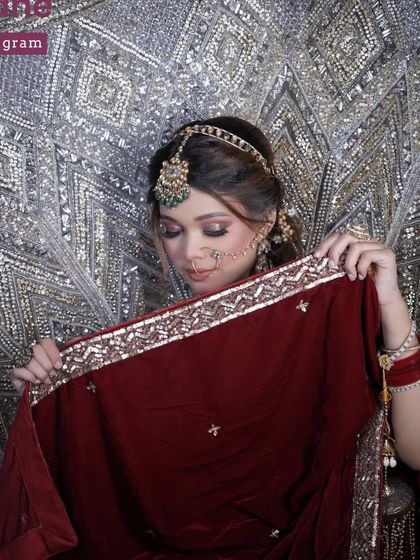 This pose with the velvet dupatta adds a touch of mystery and elegance. I guide my students on creative direction to make their portfolio shots stand out.