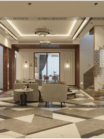 This living lobby is defined by its bold geometric flooring and a custom metal screen by the staircase. We used a neutral color palette with pops of gold and rich textures to create a luxurious yet comfortable atmosphere.