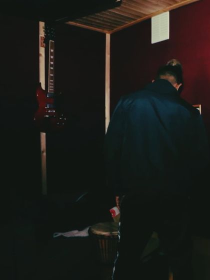 Another candid moment from the studio. Sometimes you just have to get up and feel the beat you're making. The process is just as important as the final product.