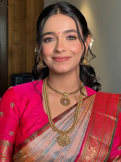 My bride Soumita, shining with soft eyes and fresh skin. The makeup was designed to let her natural beauty and happiness be the focus.