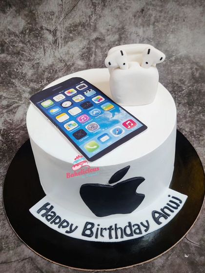 For the Apple enthusiast, this cake features the iconic logo, an edible iPhone print, and handcrafted AirPods. It's a sleek and modern design with a premium pineapple flavour.