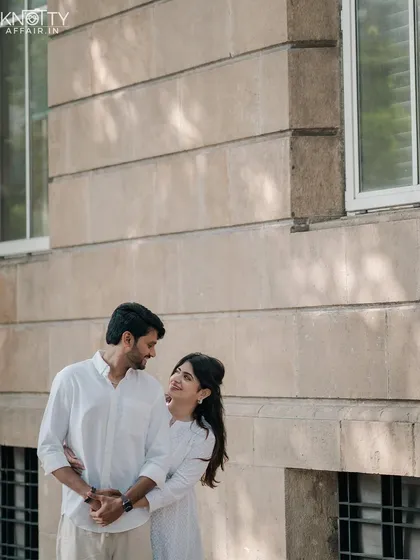 A classic, happy portrait against the colonial architecture of South Mumbai. The genuine smiles and easy connection between them make this a simple yet beautiful pre-wedding shot.