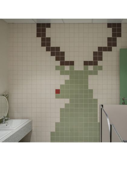 A festive reindeer, complete with a red nose, adorns the wall of this washroom. The painstaking arrangement of tiles to create these images was a labor of love that brings so much joy.