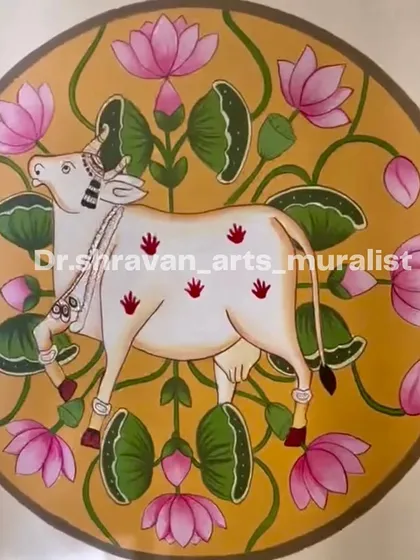 This circular Pichwai painting is a perfect example of how traditional art can be used as a modern decor element. The single cow surrounded by lotuses adds a touch of elegance to any wall.