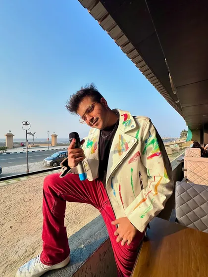 Another shot from my post-event chill session. The mic might be down, but the host is still soaking in the good vibes.