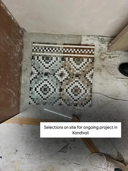 On-site selections are a key part of the process. Here, I'm choosing mosaic tiles for an ongoing project, ensuring the materials perfectly match our design vision.