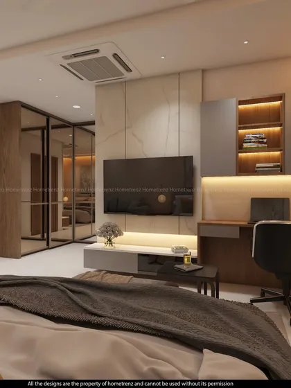 Another angle of the spacious guest bedroom, highlighting the mirrored wardrobe and the clean, modern aesthetic.
