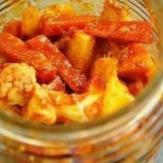 A simple, delicious bowl of Gobi Gajar Shalgam pickle. A perfect accompaniment to dal, roti, or parathas.