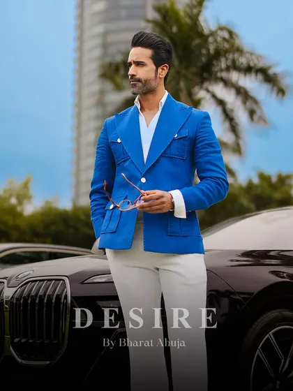 I believe in creating clothes that match your ambition. This vibrant blue summer blazer is tailored from a premium, breathable fabric and designed with a sharp, powerful silhouette for a look that is both classic and confident.