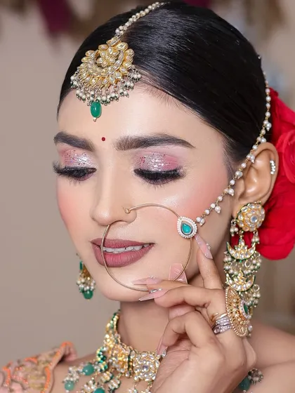 A close-up showing the detailed glitter work on the eyes. Students learn how to apply glitter and pigments without fallout for a clean, professional finish.