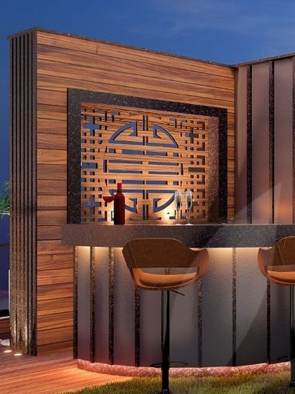 The perfect bar corner for your terrace. This design features a custom back-lit jaali panel with an Asian-inspired motif, adding a touch of intricate detail and cultural flair.