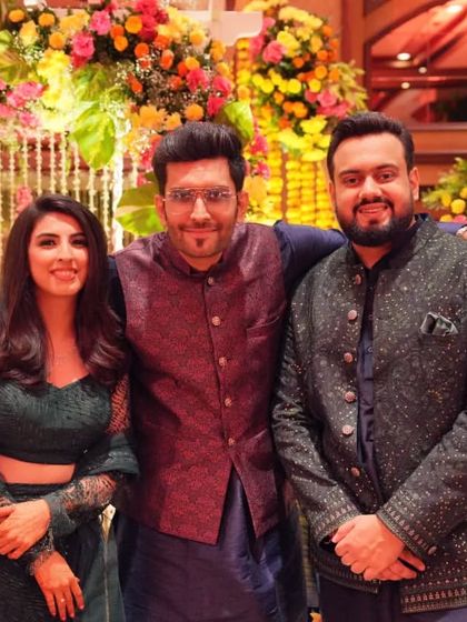 Happy Anchor, Happy Couple! Posing with the lovely couple at their wedding event at Taj Lands End, Mumbai. Their smiles say it all.