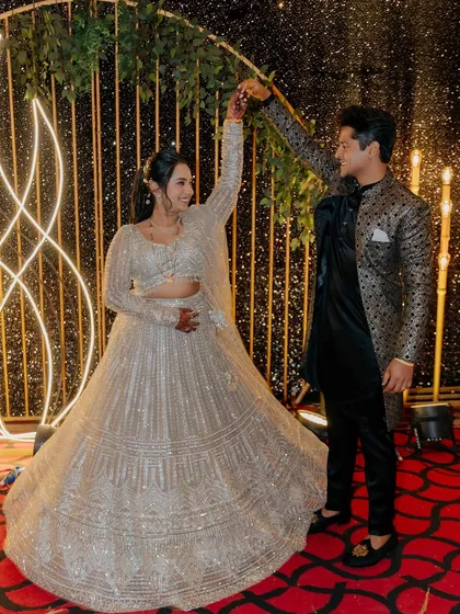 The couple dancing, perfectly in sync.