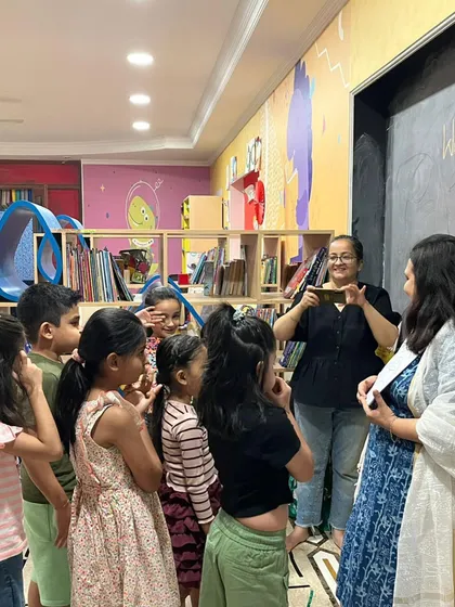 Look at those curious faces. We love it when children get fully involved, asking questions and interacting with the storyteller and each other during our reading programs.