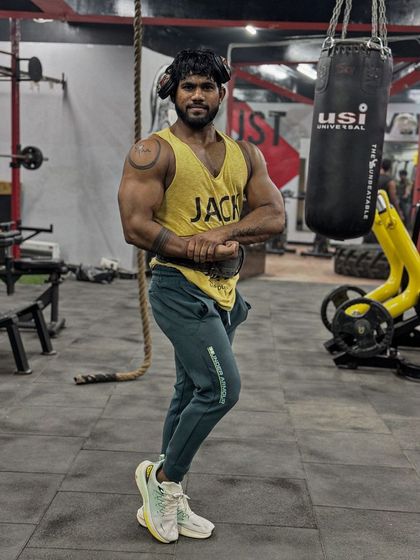 A side pose showing the full length of the physique. Every muscle group has to be developed for a balanced look.