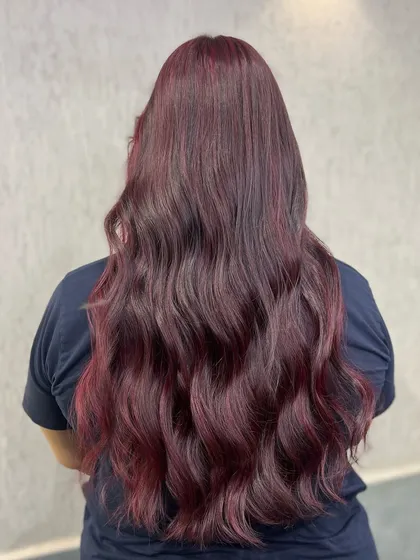 Red hair, don't care. This is a perfect Christmas-inspired red, deep and festive, styled with beautiful waves.