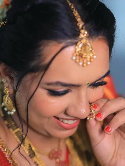 It’s all in the details. This close-up from a naming ceremony shows the soft, blended eye makeup and the natural, radiant skin finish that is my signature, ensuring you look perfect both in photos and in person.