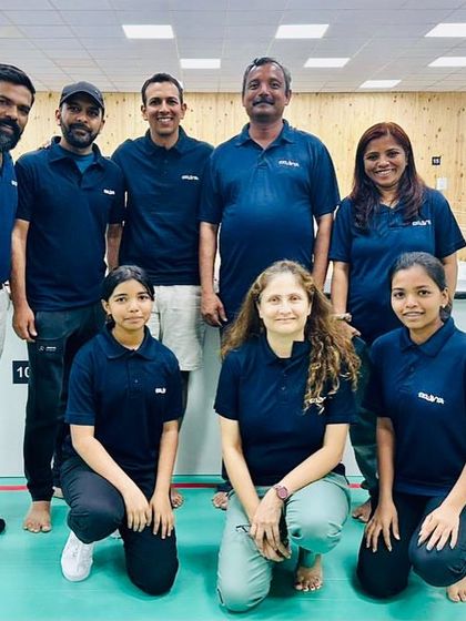 Our coaching team with a guest speaker. We are committed to continuous learning and collaboration to bring the best training methodologies to our students.