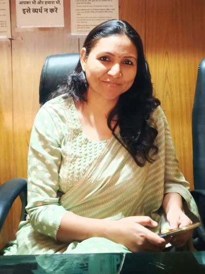 A colleague sitting in the office during the Diwali celebration.