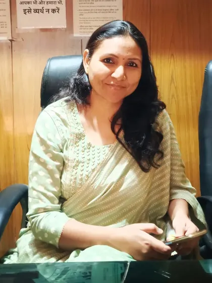 A colleague sitting in the office during the Diwali celebration.