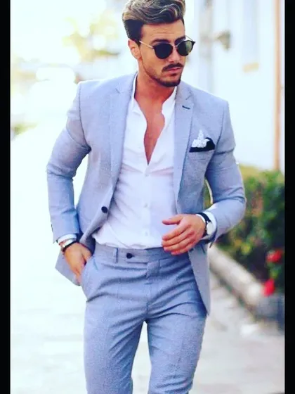 A light blue suit perfect for a summer day event or a destination wedding. This relaxed yet stylish look shows that formal wear can be comfortable and modern.