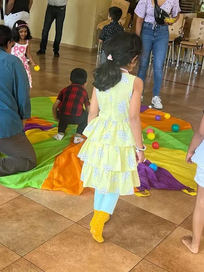 Parachute games are always a highlight at outdoor birthday parties. It's a great way to get kids to play together and burn off some of that party energy.