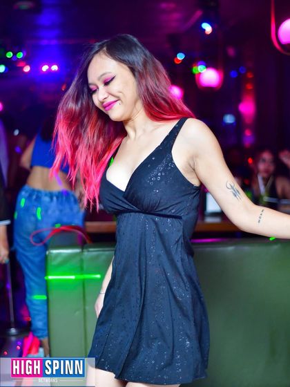 A guest dancing and feeling the music at Drava. The dance floor is always the main attraction.