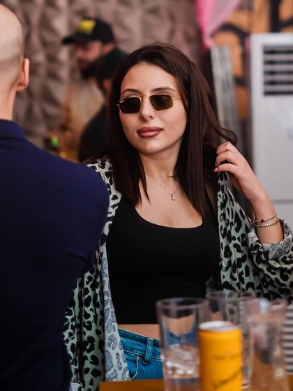 A stylish guest enjoying the party. The fashion at my events is always on point.