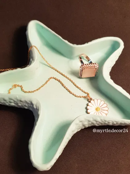 A different angle of our teal starfish tray, showcasing its vibrant color and textured finish.