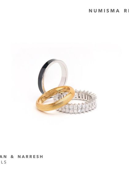 This stack of Numisma Rings by Shivan & Narresh is perfect for the modern woman. It features an etched gold ring, a bold enamel ring, and a radiant white stone-studded eternity band.