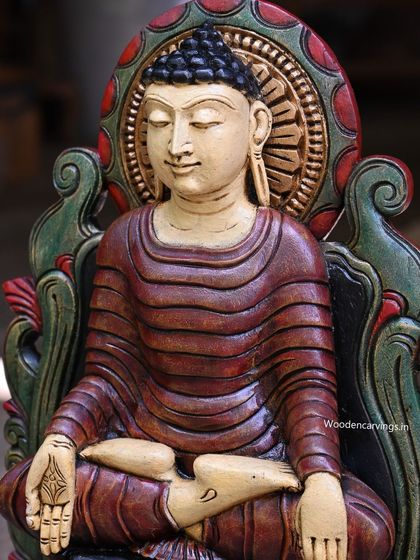 A close-up of the face of the 24-inch ancient-look Buddha, showing the calm, meditative expression.