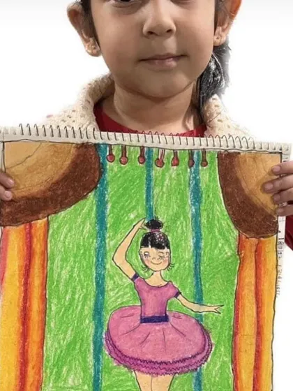 This student created a beautiful drawing of a ballerina on stage. It's a wonderful example of how art can capture movement and grace.