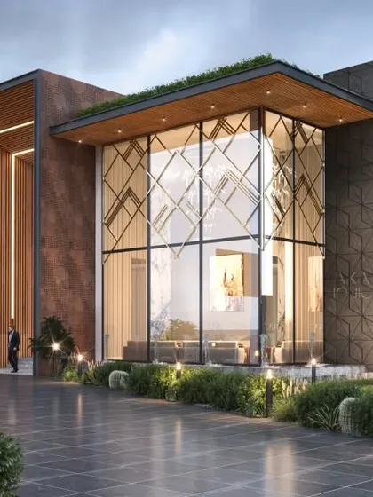 Located in Chattarpur, New Delhi, this farmhouse design emphasizes transparency and light with a double-height glass facade. The goal was to blur the lines between the luxurious interior and the expansive, landscaped exterior.