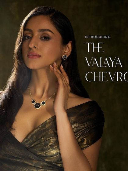 The introductory campaign image for "The Valaya Chevron" collection by JJ Valaya for Aulerth, showcasing the signature black enamel work.