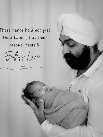This portrait is overlaid with the text, "These hands hold not just their babies, but their dreams, fears & endless love," perfectly summarizing the emotion of the image.