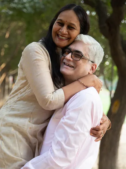 Love is timeless, and it's a joy to capture it at every stage. This beautiful, lighthearted moment from an anniversary shoot shows that the fun and affection only grow stronger through the years.
