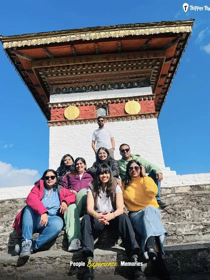 The crew taking a well-deserved rest at Dochula Pass. The smiles say it all. The shared experience of exploring such a beautiful country brings everyone closer.