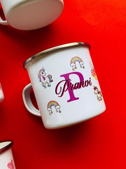 For the unicorn and rainbow lovers, we designed this adorable personalised enamel mug. It's perfect for milk, hot chocolate, or any of their favorite drinks.