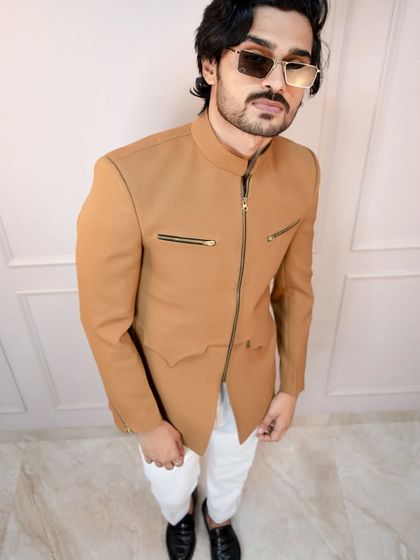 A closer view of the tan zipper bandhgala, showing the textured fabric and the clean lines of the design. It's a perfect blend of royal and modern aesthetics.