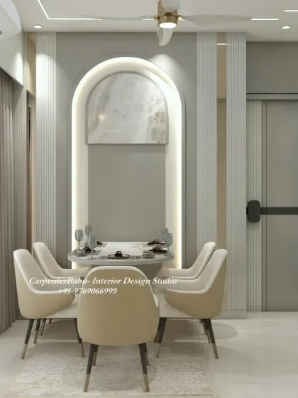 A dining area set against a wall with vertical fluting and an arched, marble-finish niche. The design is a beautiful play on classic architectural elements in a modern context.