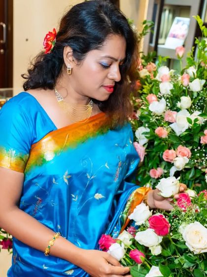 Admiring the beautiful floral decor at the Tanishq 'Nava-Rani' collection launch. Every detail of an event contributes to the overall experience, and I make sure to highlight the ambiance I help create.