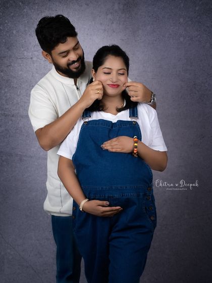 A playful cheek pinch! These candid, fun moments between a couple often become their favorite photos from the session.