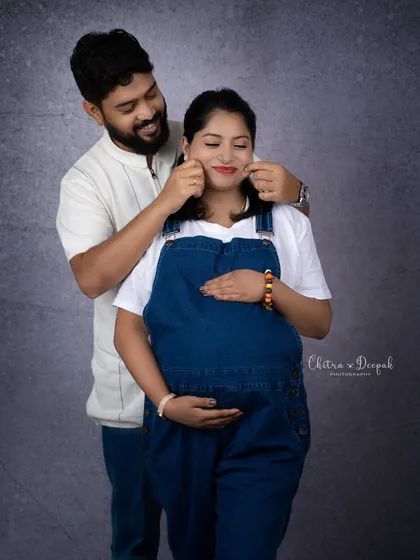 A playful cheek pinch! These candid, fun moments between a couple often become their favorite photos from the session.