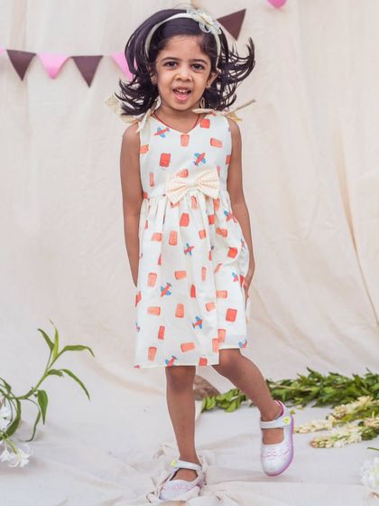 Ready to take on the world in this adorable printed A-line dress. The fun pattern and comfortable sleeveless design make it perfect for a day of adventure.