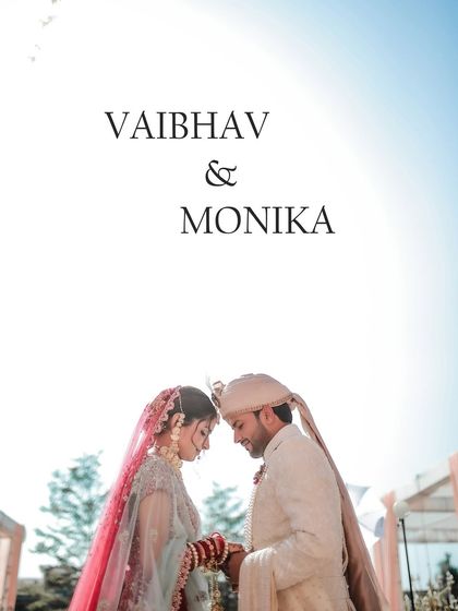 A simple, elegant portrait of the couple touching foreheads after their wedding ceremony.